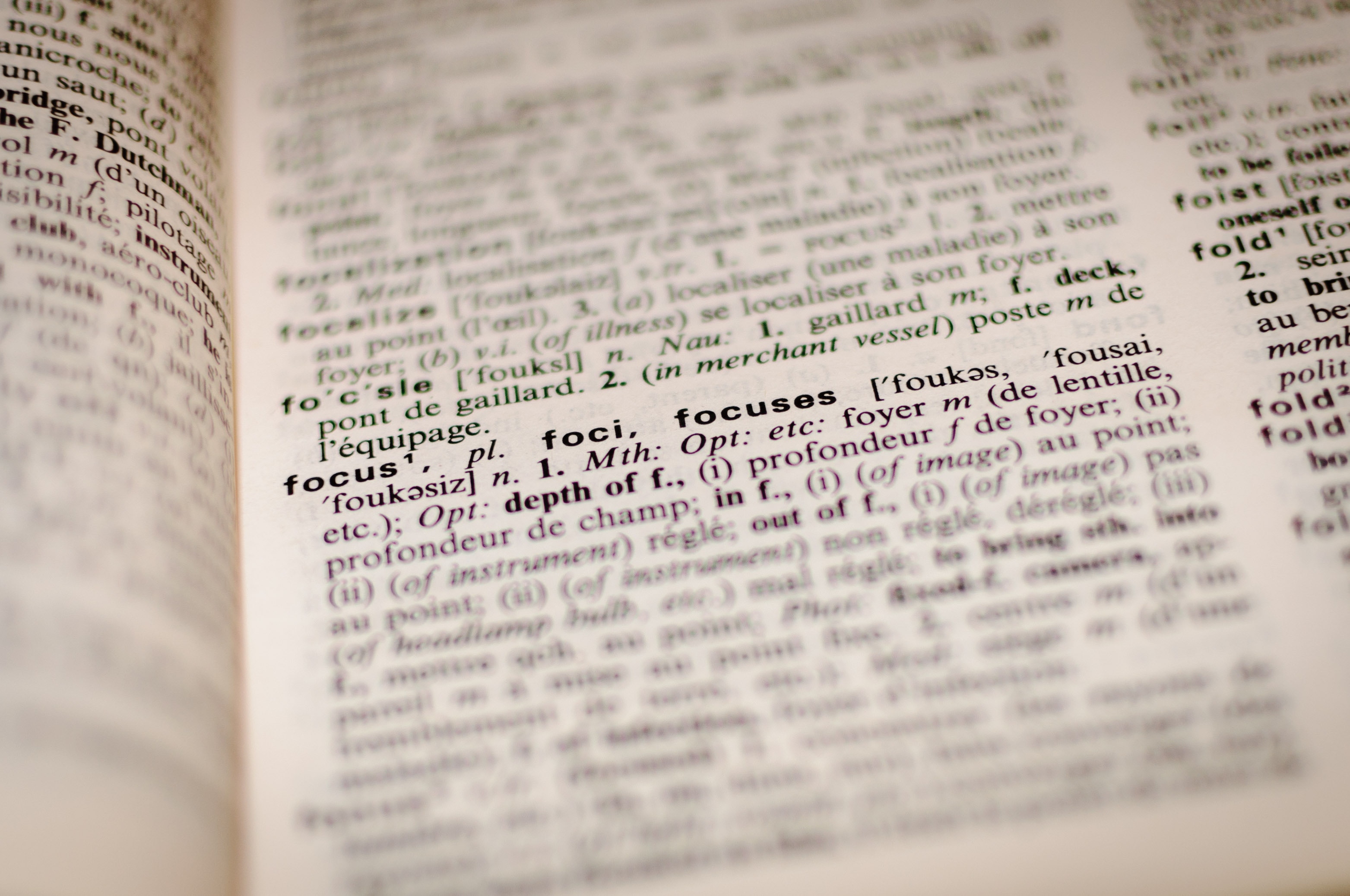 Close up of the definition of the word focus in a dictionary